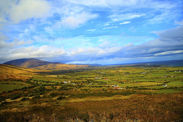 panoramic view of Vinatrex artisan cheese farm in County Cork Ireland with green rolling pastures and stone buildings